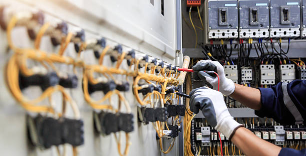 Professional Electrician technician working in Tequesta, FL